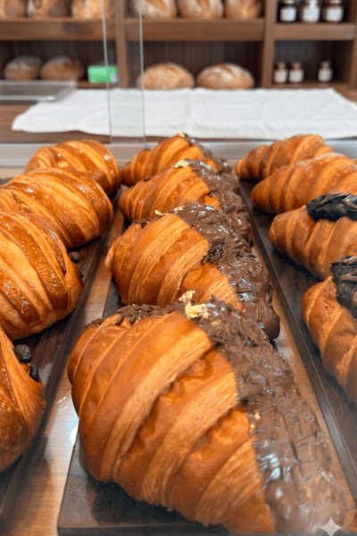 Croissant Nutella Chocolate-filled croissants in the display case at Tico’s Bakery, Tampa